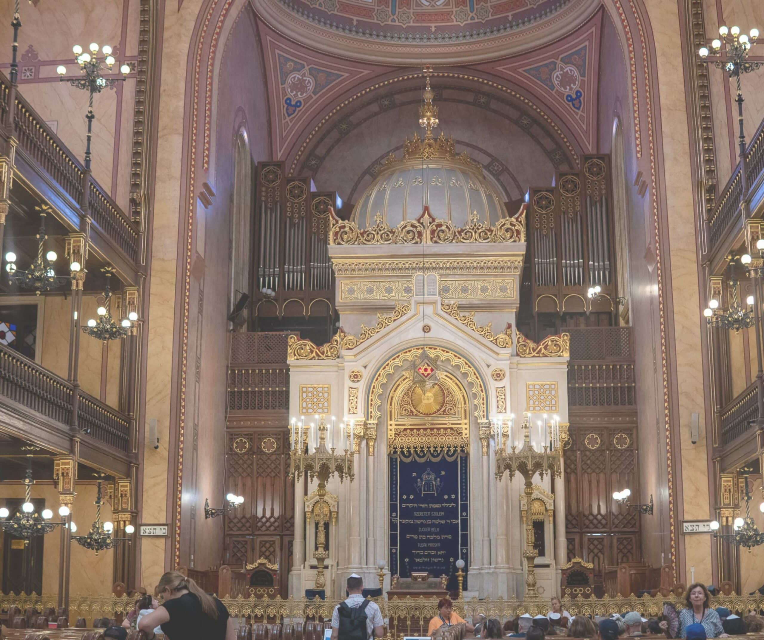 Interior of the Dohány Street Synagogue with coral red and gold decoration