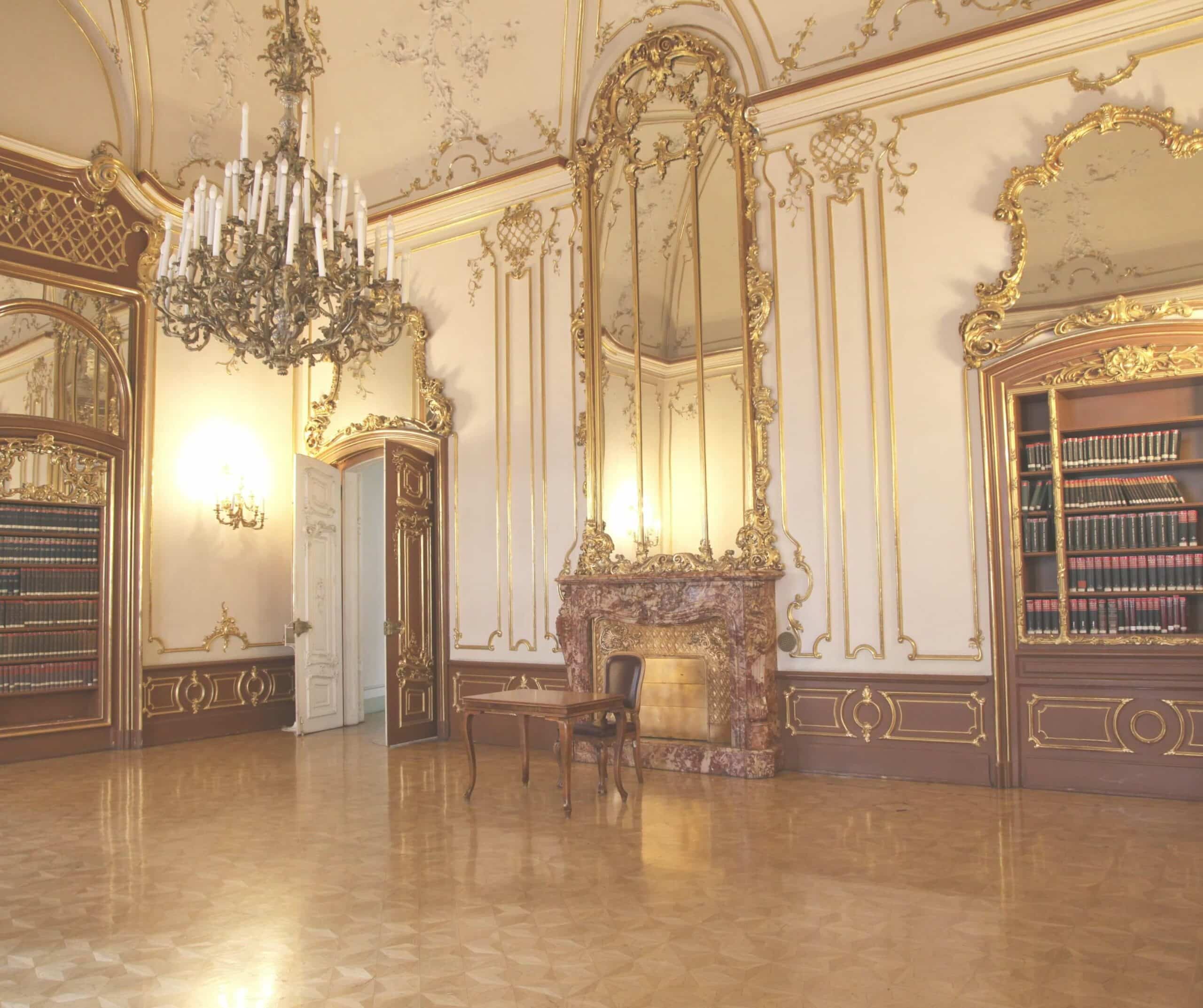 Ornate palace reading room with chandeliers at the Metropolitan Ervin Szabó Library in Budapest