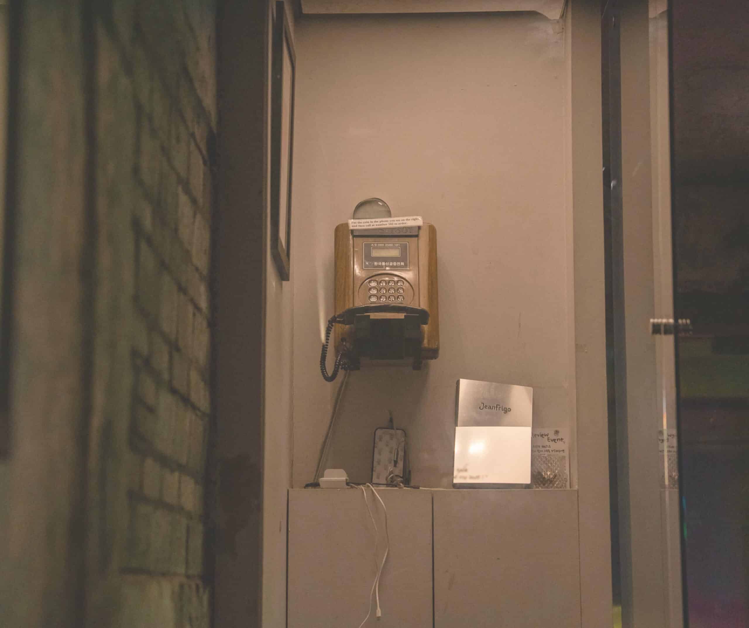 The vintage payphone used to order drinks at Jean Frigo
