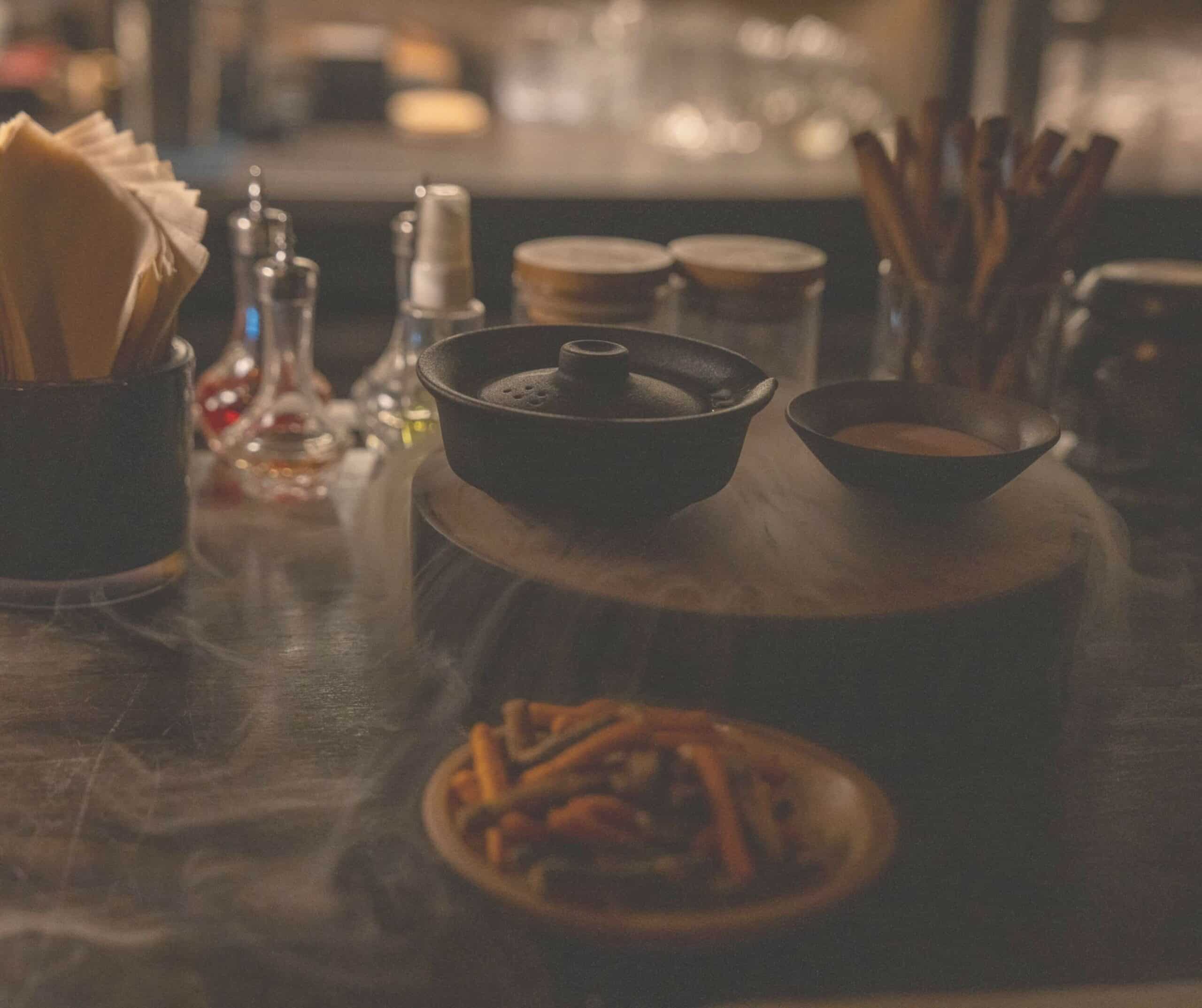 The Jukryeokgo and Omija cocktail arriving in a pot with nitrogen smoke at Ghiwon 22, Seoul